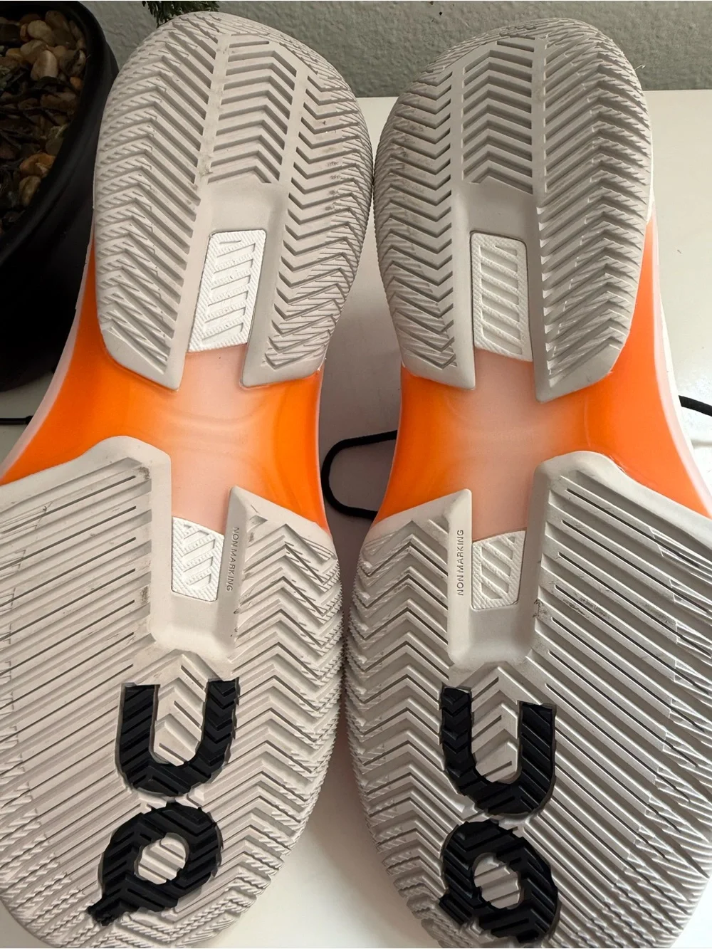 On the Roger pro fire men size 9  or women size 10 pink and Orange Men's Athleti